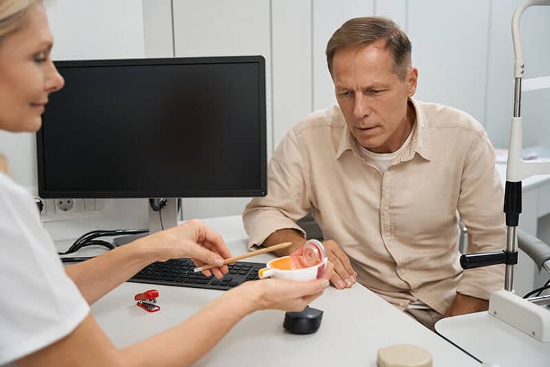 Eye Doctor Speaking to a Patient