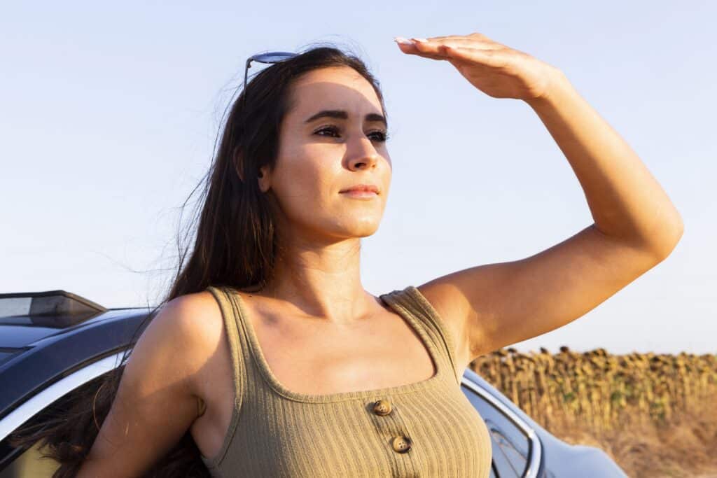 woman-looking-sun-while-enjoying-nature-san-diego
